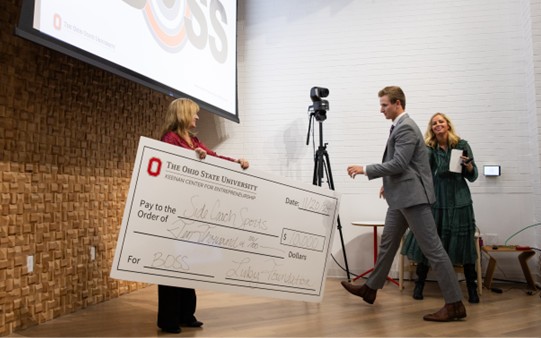 Accepting the Best of Student Startups award at Ohio State in 2024